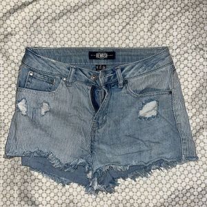 Half striped other half light wash blue Jean shorts